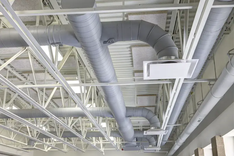 Réseau gainable de distribution collective en plafond technique — climatisation réversible EHPAD en France